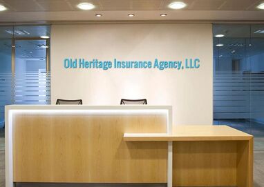 Old Heritage Insurance Agency, LLC logo printed on the wall